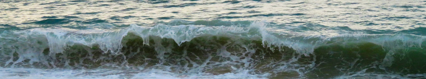 waves breaking on the beach